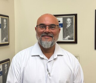 Staff member Robert Guzman from ID_167284