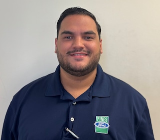 Staff member Osvaldo Naranjo from ID_02f51f