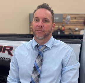 Staff member Dustin O'Donnell from ID_390255