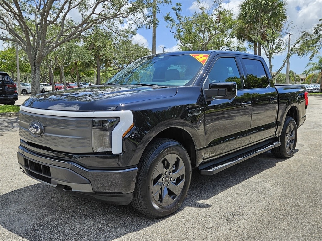 Used 2022 Ford F-150 Lightning Lariat with VIN 1FT6W1EV3NWG04567 for sale in Pembroke Pines, FL