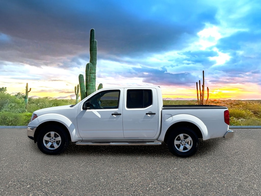 Used 2009 Nissan Frontier SE Truck Crew Cab