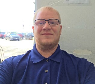 Staff member Mitch Edge from ID_f63dec97b8d5