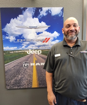 Staff member Jason Mancias from ID_76b8fa0679e8