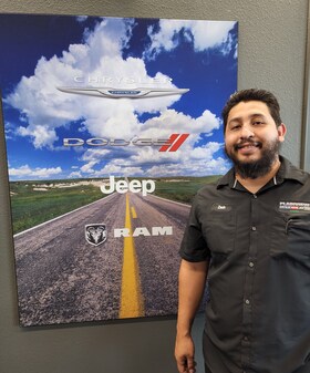 Staff member Zack Sanchez from ID_a8c4c88dfc90