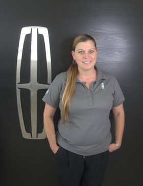 Staff member Ashley Hewitt from 1d674b24ff0a