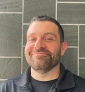 Staff member Mike Santos from 38e6286fca42