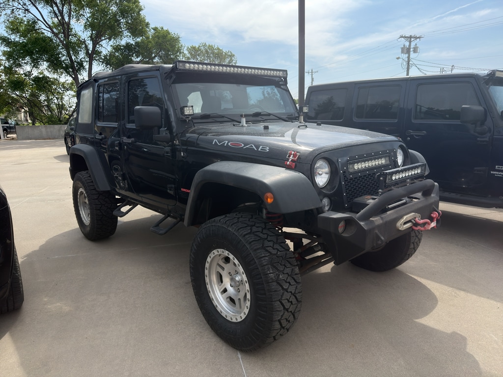 Used 2014 Jeep Wrangler Unlimited Sport with VIN 1C4BJWDGXEL103304 for sale in Kearney, NE