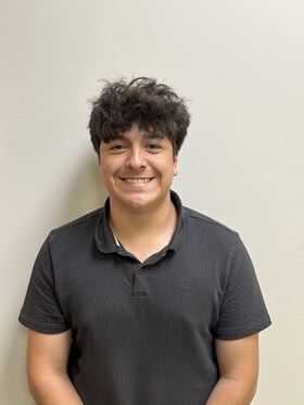 Staff member Ian Salazar from ID_ba03e67d7771