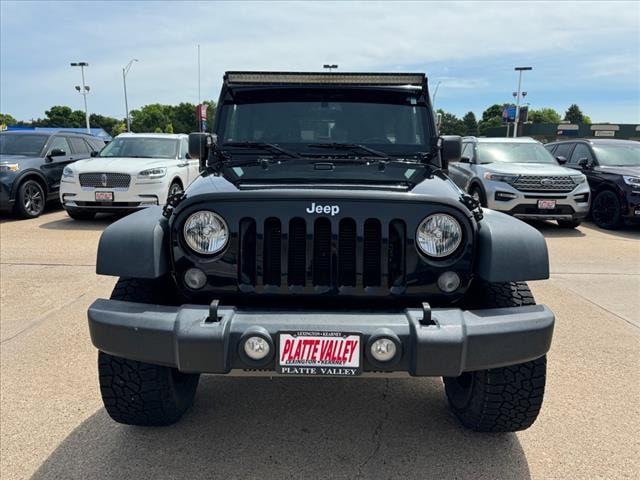 Used 2015 Jeep Wrangler Unlimited Sport with VIN 1C4BJWDG8FL509955 for sale in Kearney, NE