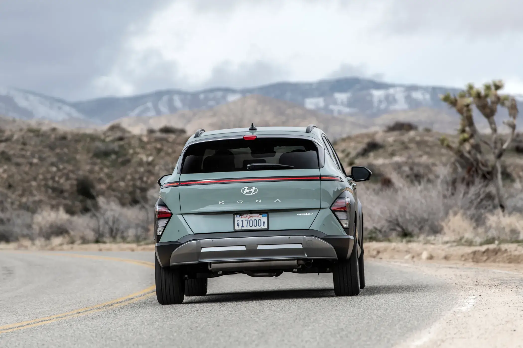 Rear view of a Hyundai Kona showing the tailgate, rear light bar and bumper