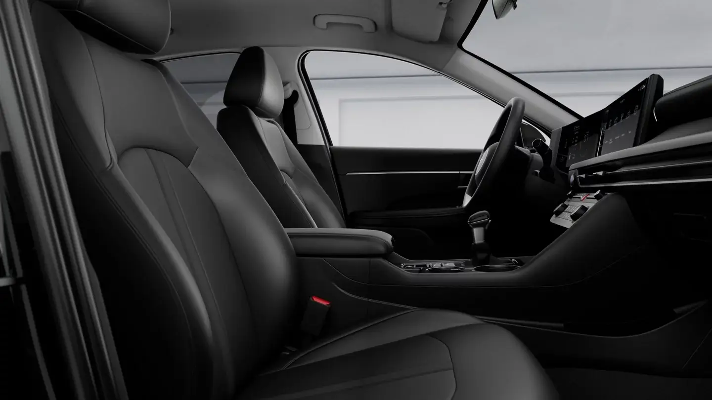 Hyundai Sonata SE black front seats seen through the open passenger door