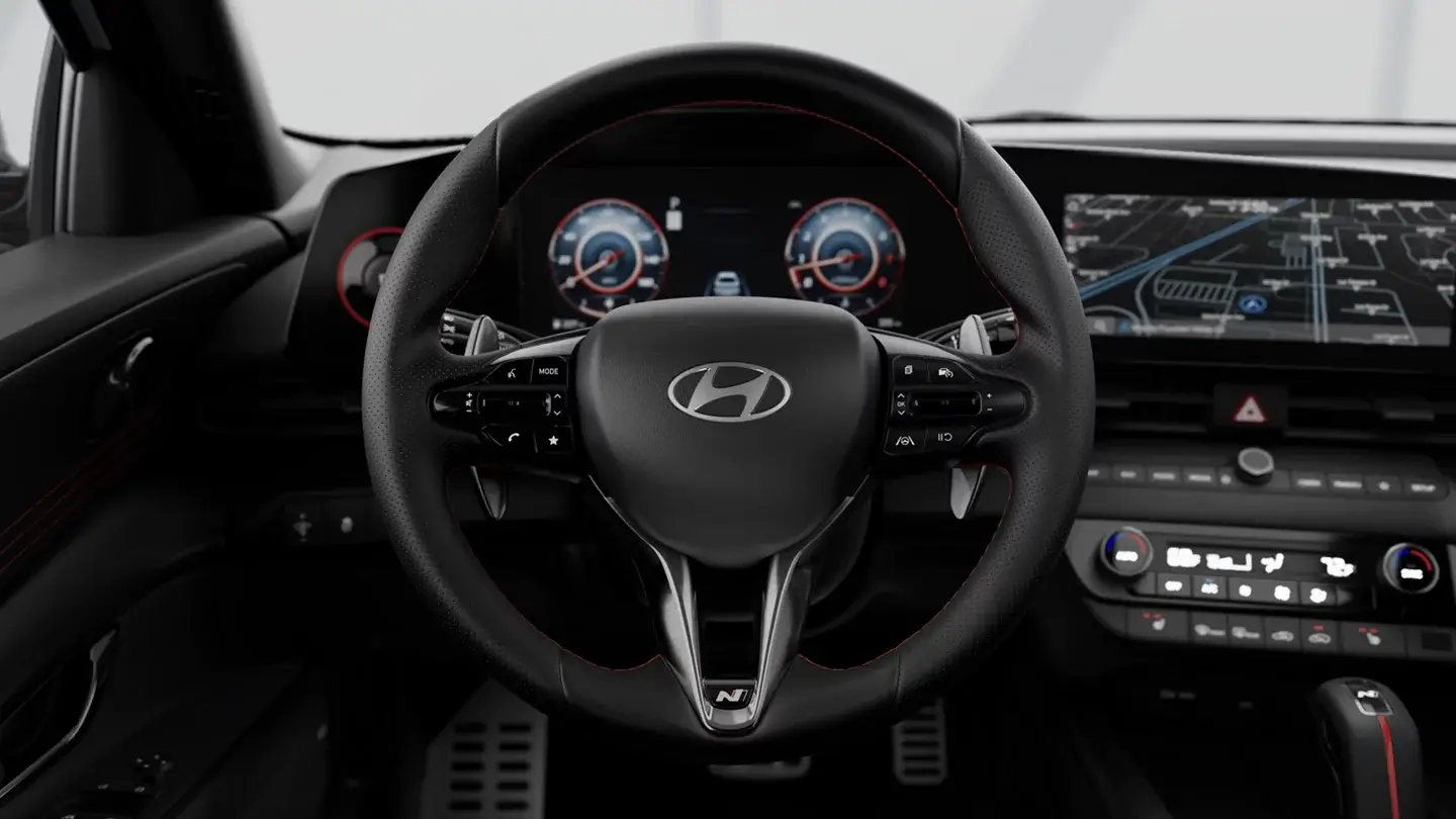 Hyundai Elantra N steering wheel with N drive-mode buttons and digital gauges