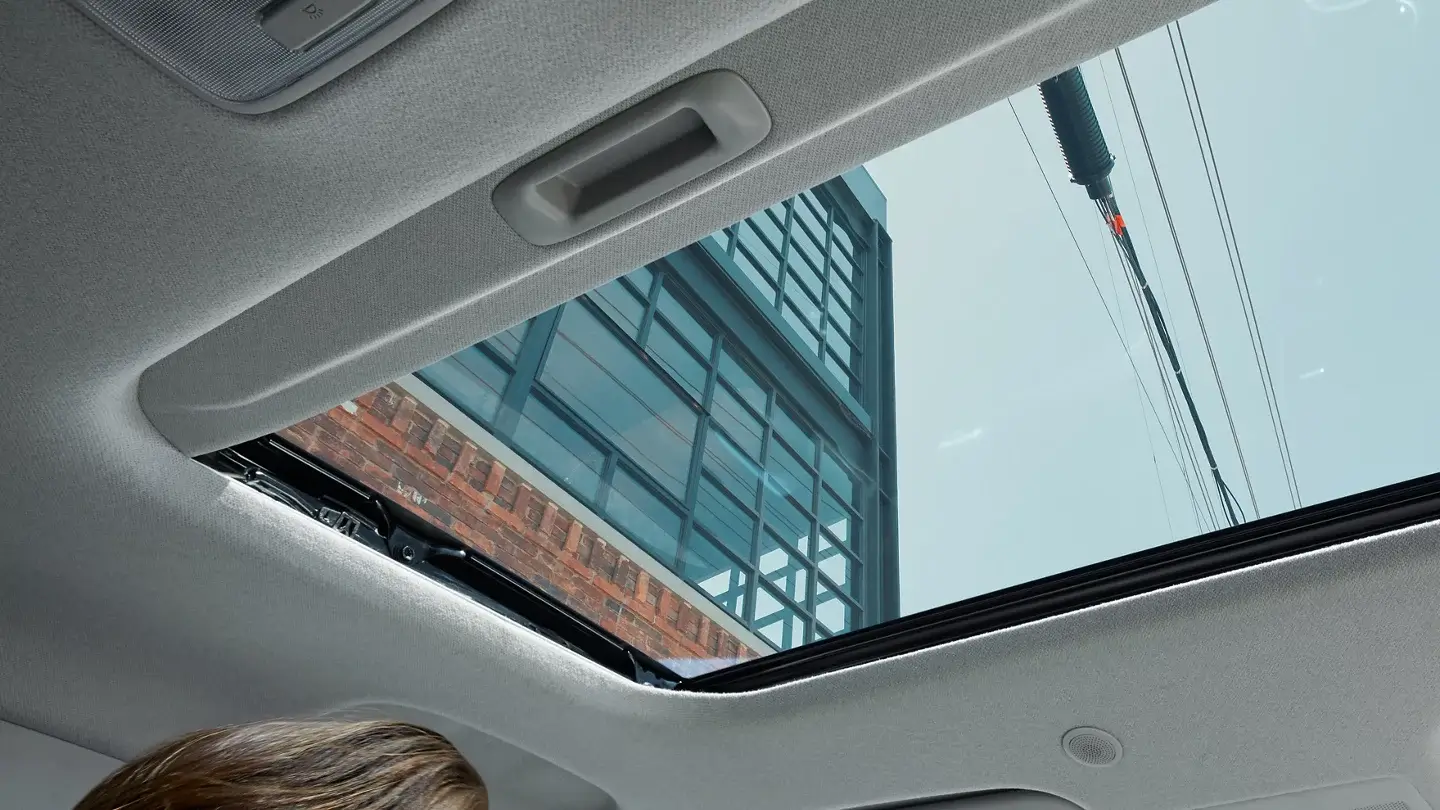 Open power sunroof on the Hyundai Venue SEL viewed from inside the cabin