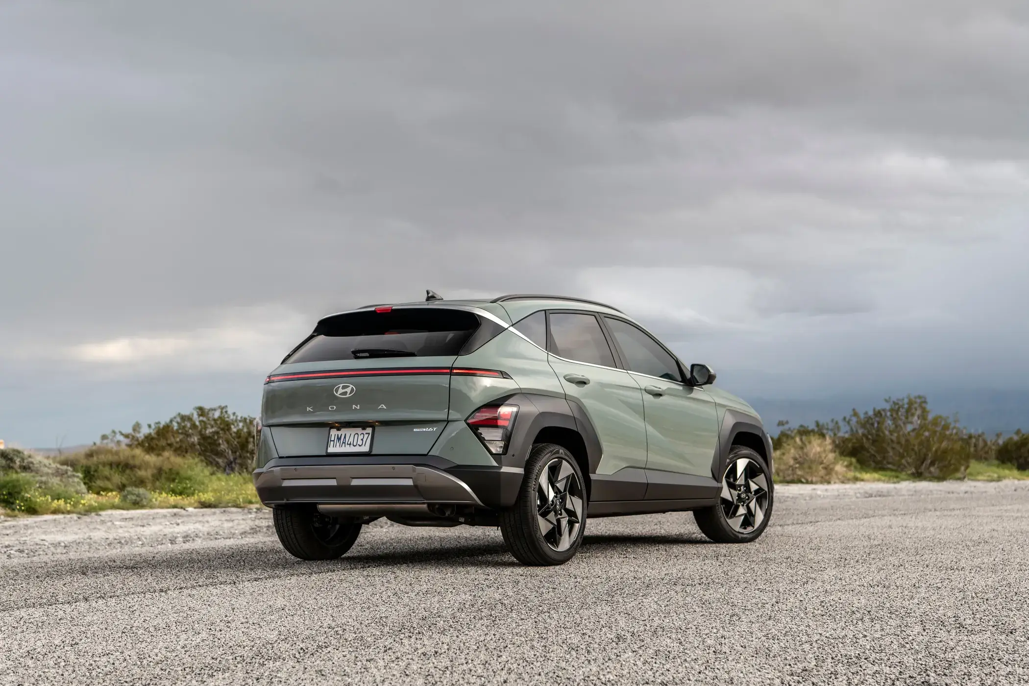 Rear three-quarter view of a Hyundai Kona showing the tailgate, rear bumper and quarter panel