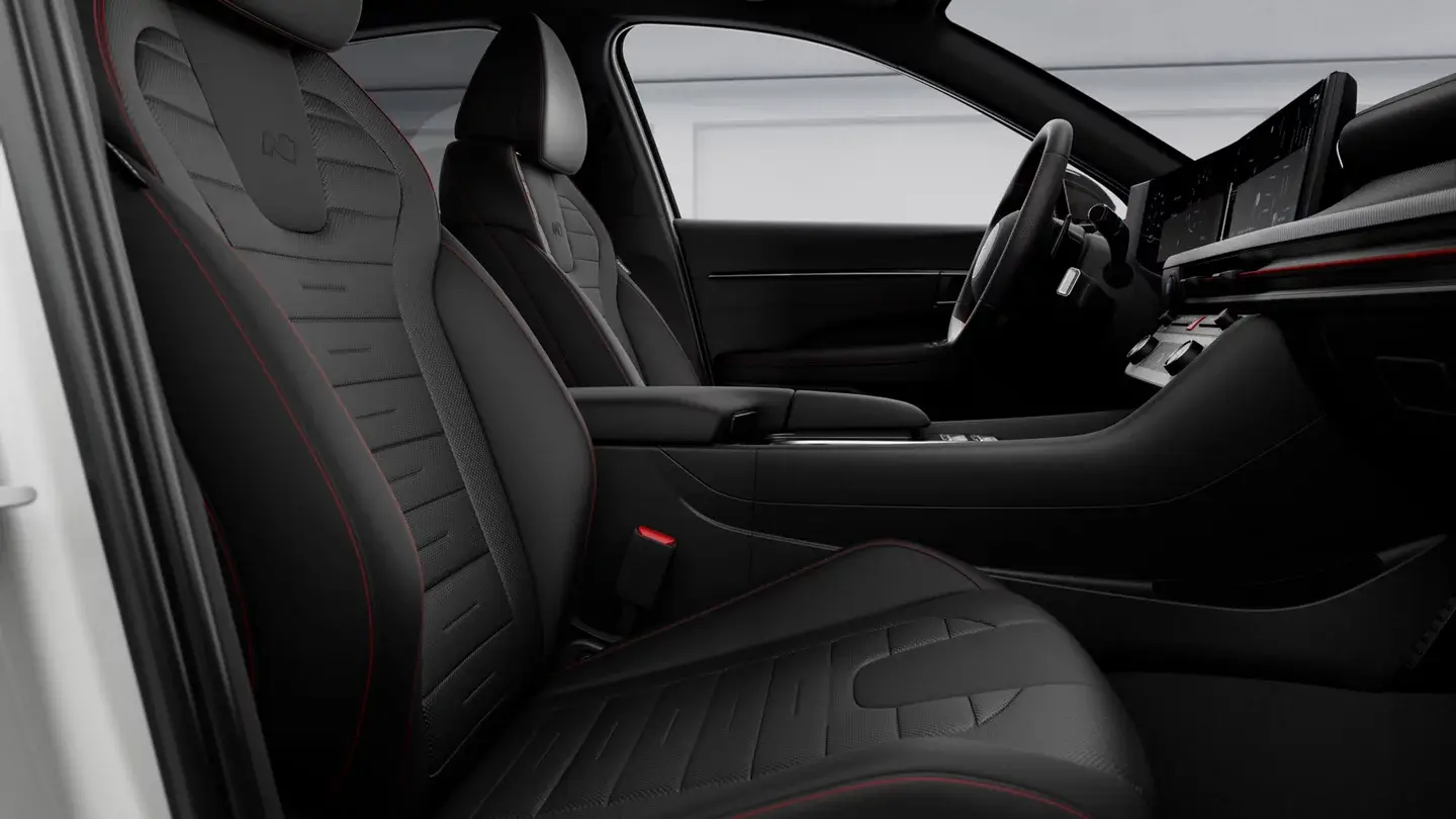 Hyundai Sonata N Line black sport seats with red stitching seen through the open passenger door