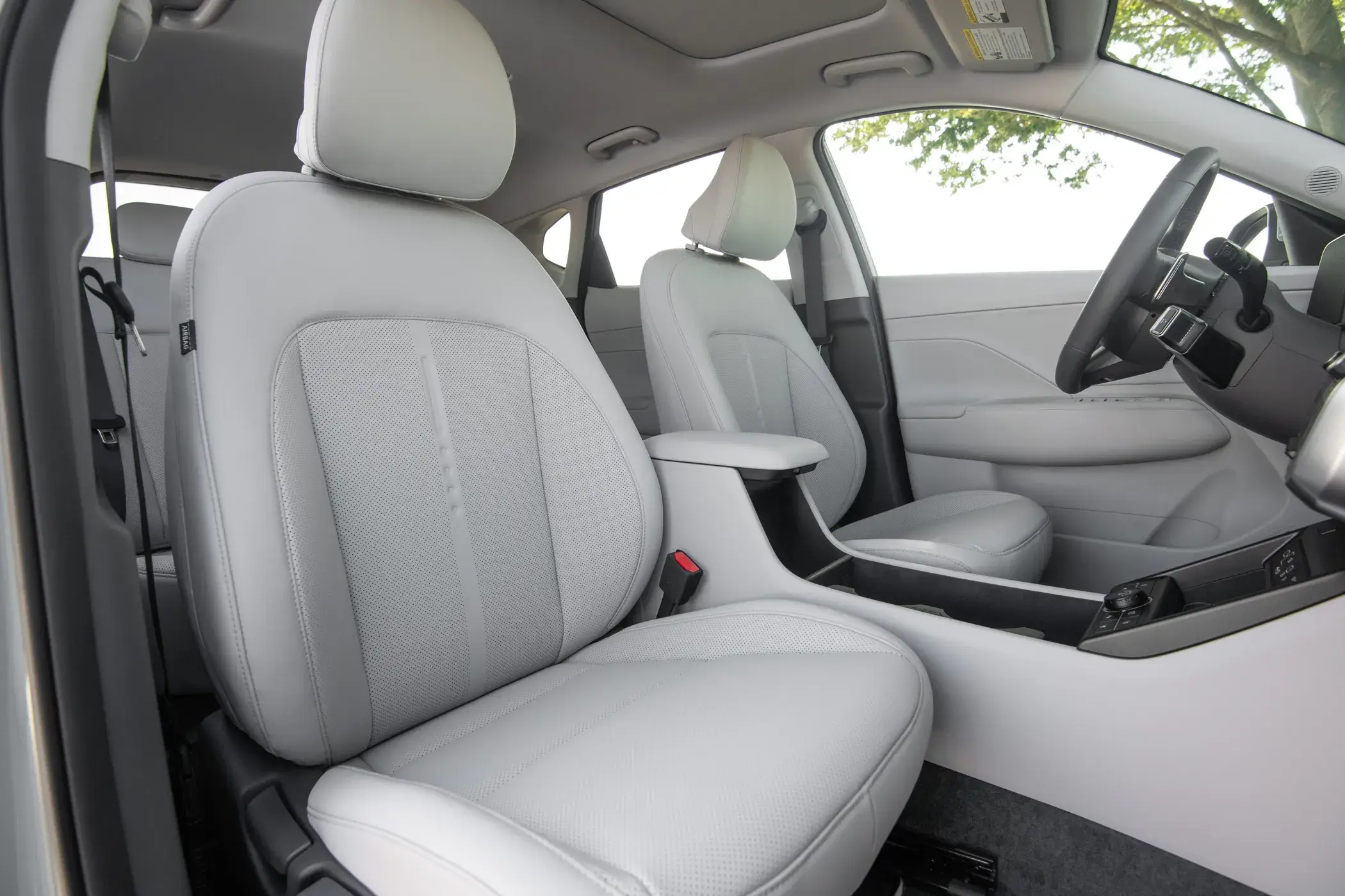 Front seats of a Hyundai Kona viewed from inside the cabin