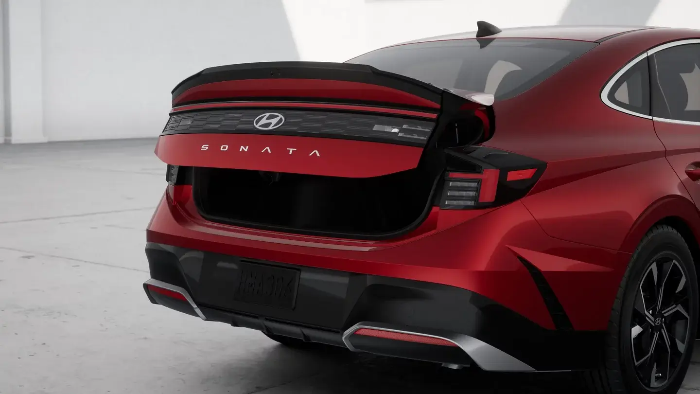 Red Hyundai Sonata SEL Sport with the trunk open, rear three-quarter view