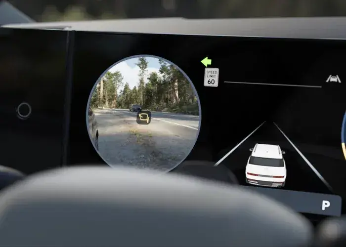 Hyundai Blind-Spot View Monitor showing a live camera feed of the adjacent lane inside the instrument cluster