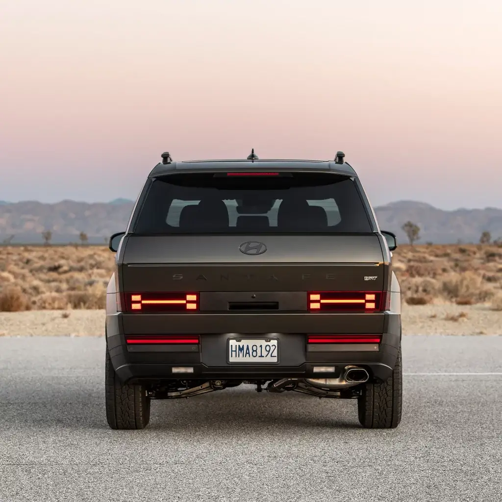Rear view of the Hyundai Santa Fe showing the tailgate, rear bumper and H-shaped lighting signature
