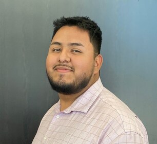 Staff member Alex Garcia from 28d71c1f8c4e