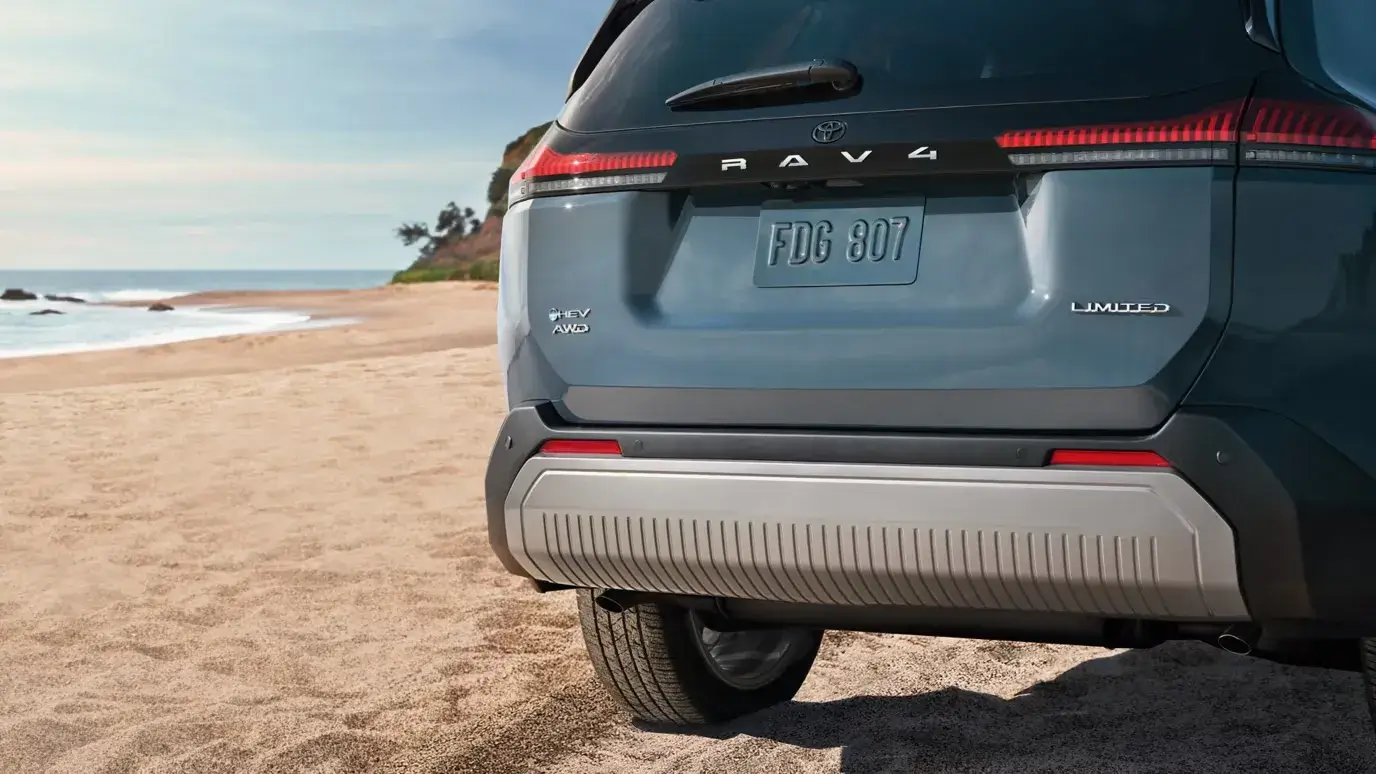 Rear view of the Toyota RAV4 showing tail lights, liftgate and rear bumper