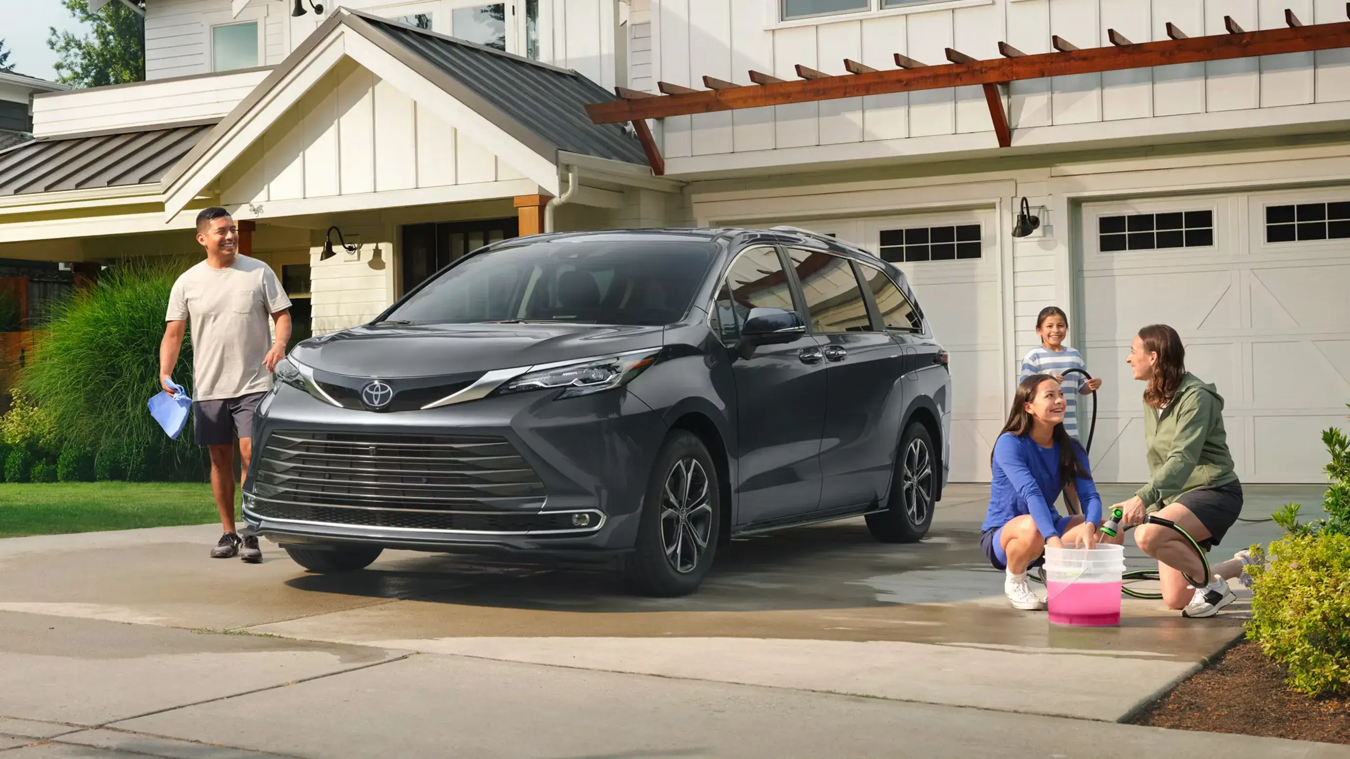2027 Toyota Sienna hybrid minivan shown from the front three-quarter angle for Plaza Toyota in New York