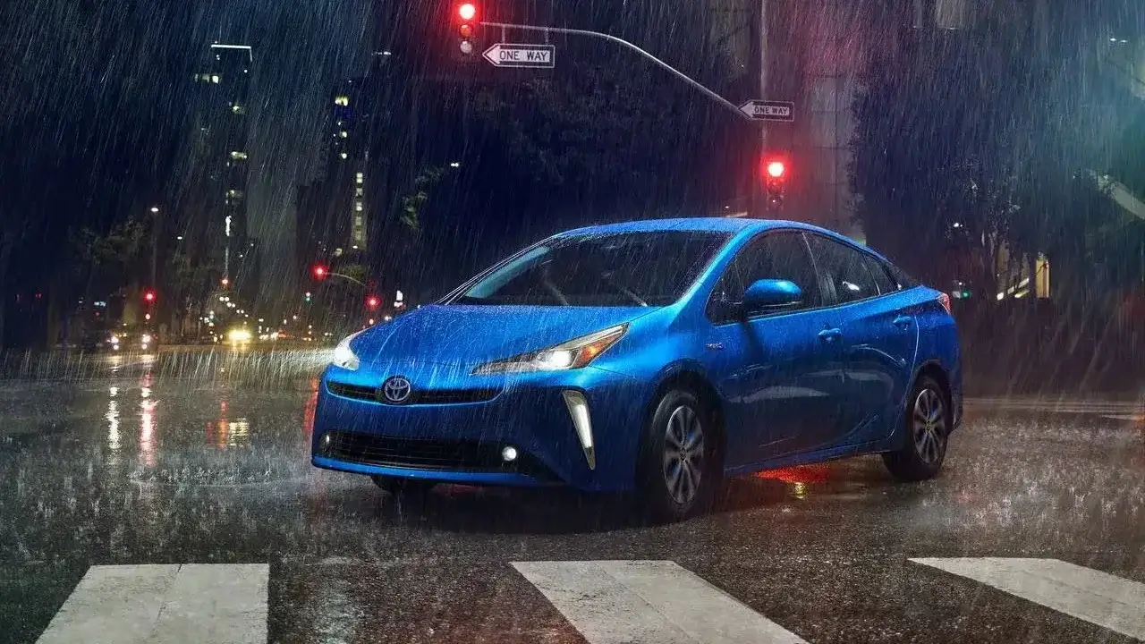 Previous-generation 2019 Toyota Prius shown from the front three-quarter angle for comparison