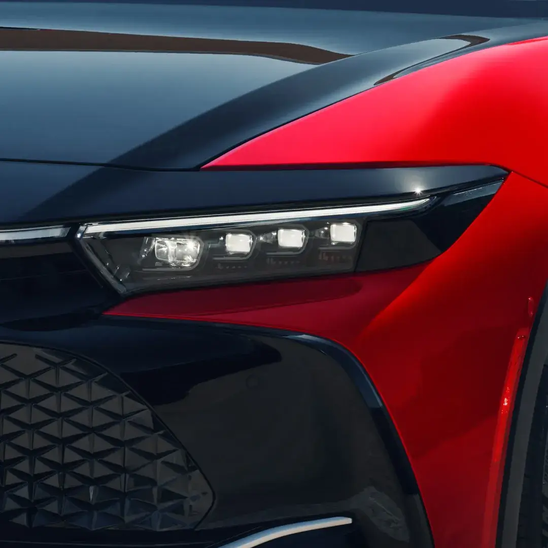 Close-up of the Toyota Crown LED headlight and hammerhead lighting signature