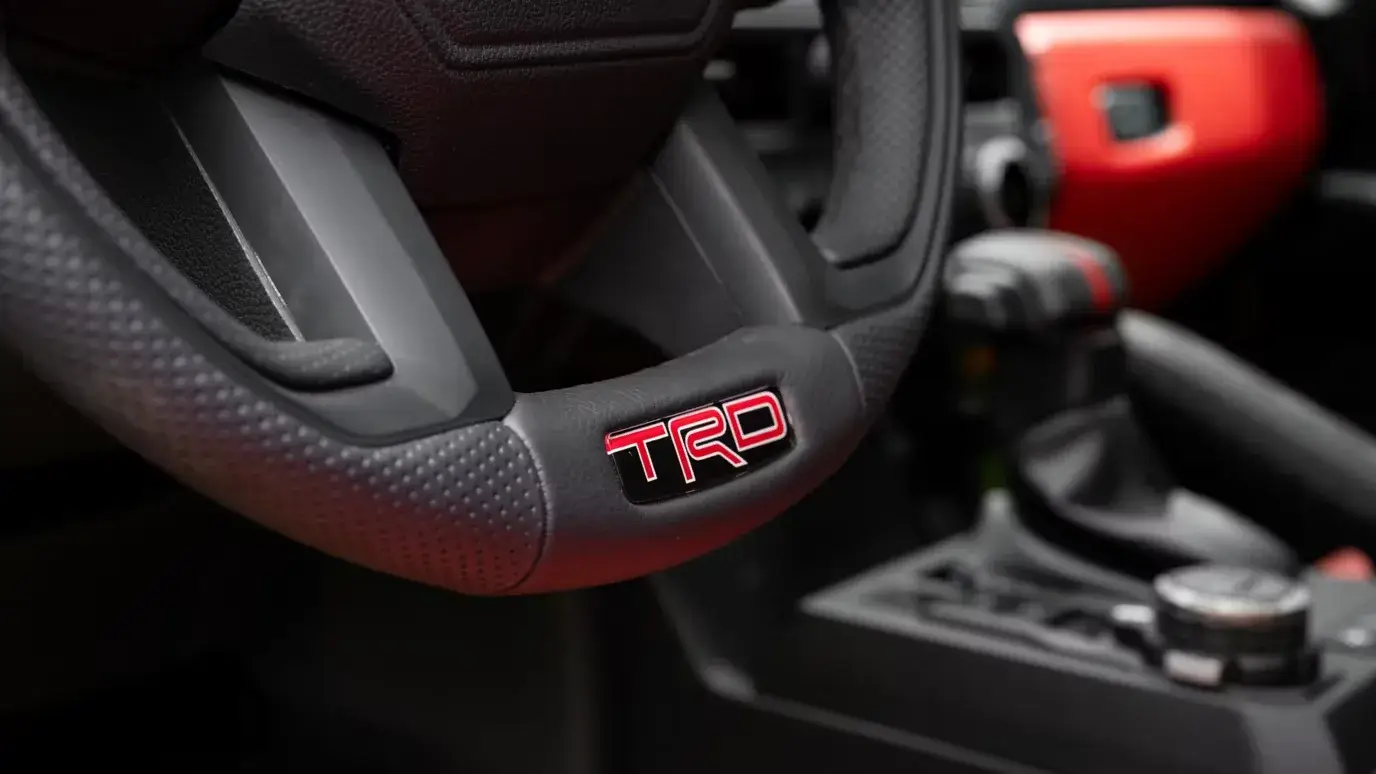 Toyota Tacoma TRD Pro steering wheel with TRD branding and red accents