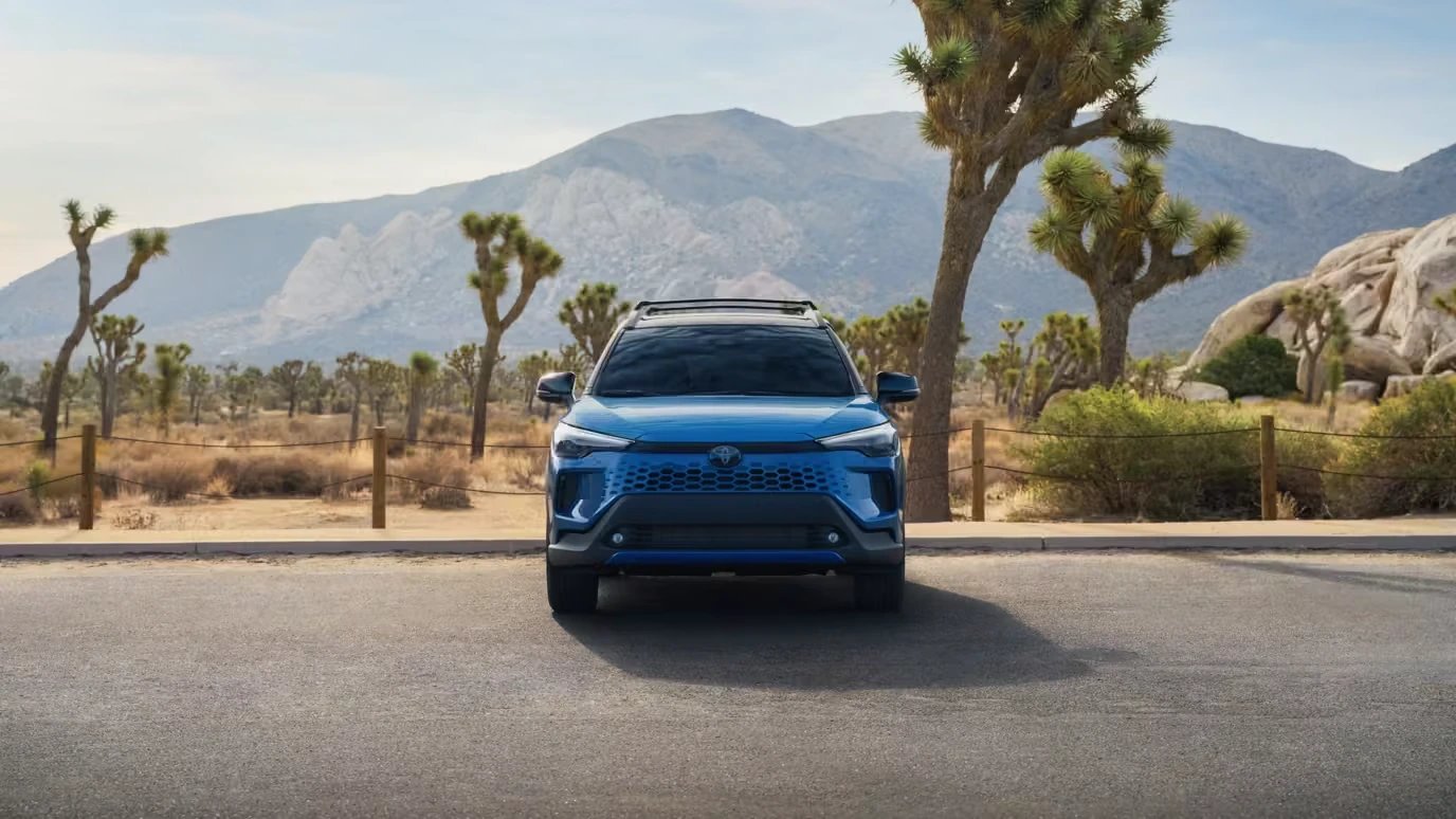 Front view of the Toyota Corolla Cross showing the wide grille design that separates gas models from the hybrid