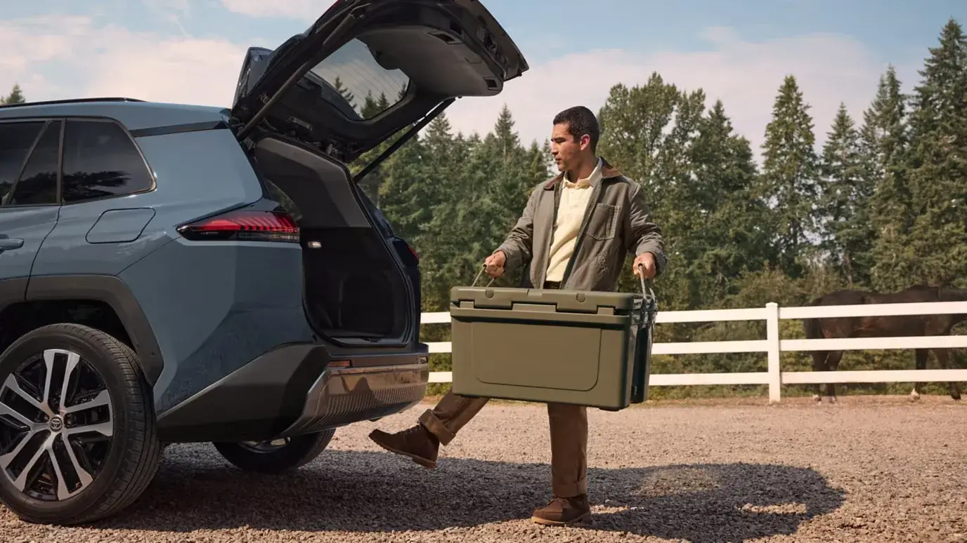 Hands-free power liftgate on the Toyota RAV4 opening with a foot motion under the bumper