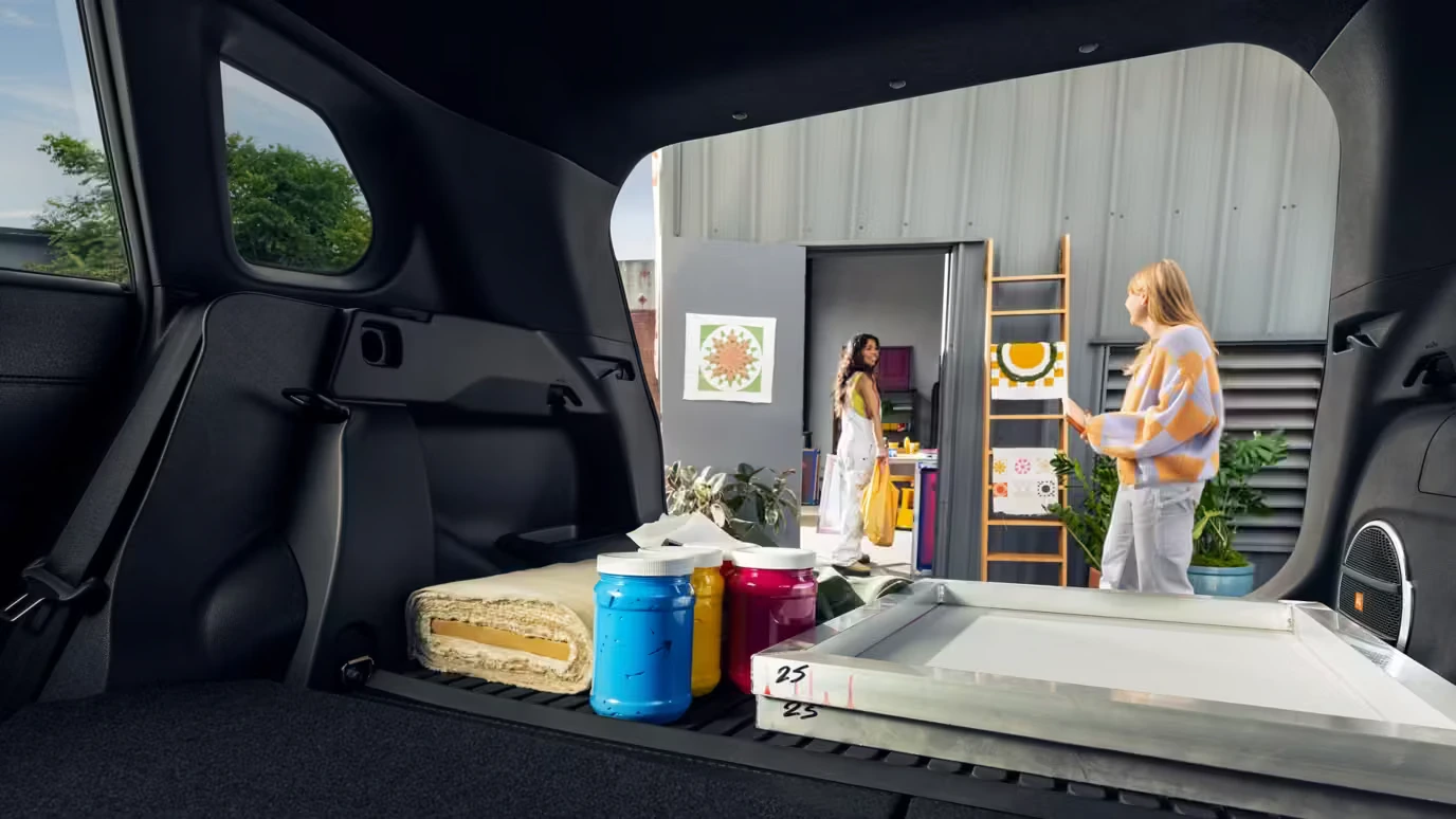 Toyota Corolla Cross with the rear seats folded flat showing the extended cargo area