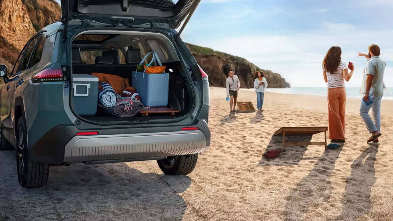 Open cargo area of the Toyota RAV4 with the rear seats upright