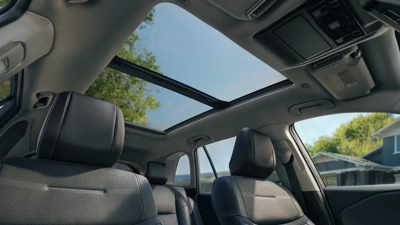 Open moonroof on the Toyota RAV4 seen from inside the cabin