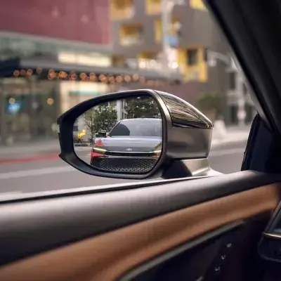 Digital rearview mirror in the Toyota Crown Signia Limited providing a clear view past loaded cargo