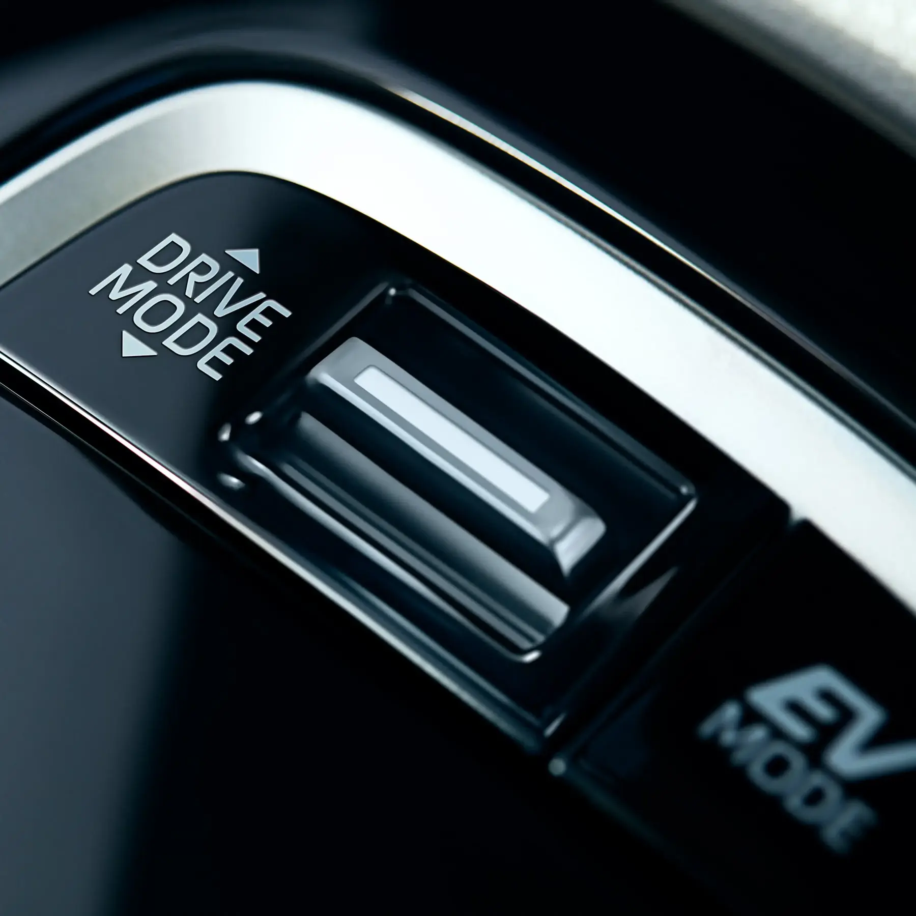 Toyota Corolla drive mode selector showing EV mode for low-speed electric driving