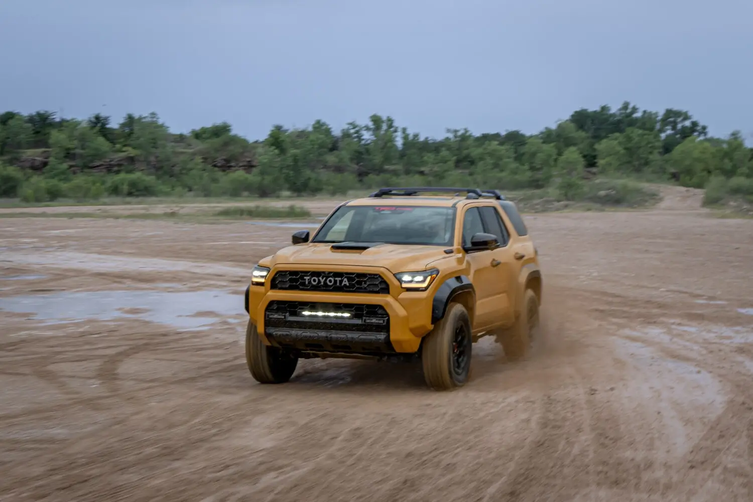 2027 Toyota TRD Pro family in Honeycomb paint shown from the front three-quarter angle