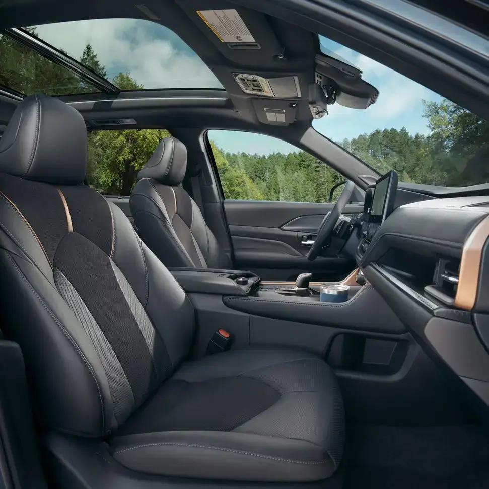 Toyota Grand Highlander interior seats shown in a Hybrid MAX cabin