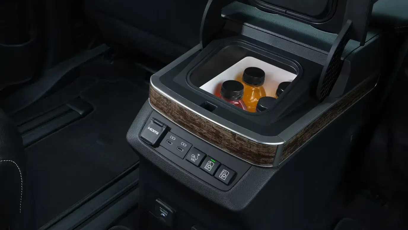FridgeBox refrigerated console compartment open inside the Toyota Sienna