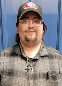 Staff member Justen Knowles from 1de3a699db81