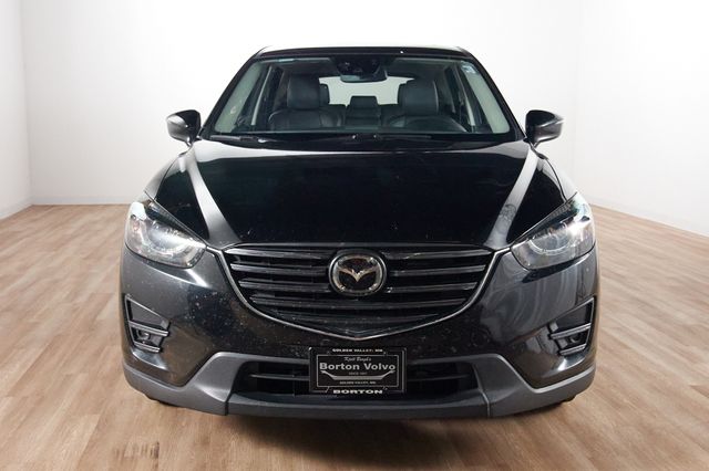 Used 2016 Mazda CX-5 Grand Touring with VIN JM3KE4DYXG0912850 for sale in Minneapolis, Minnesota