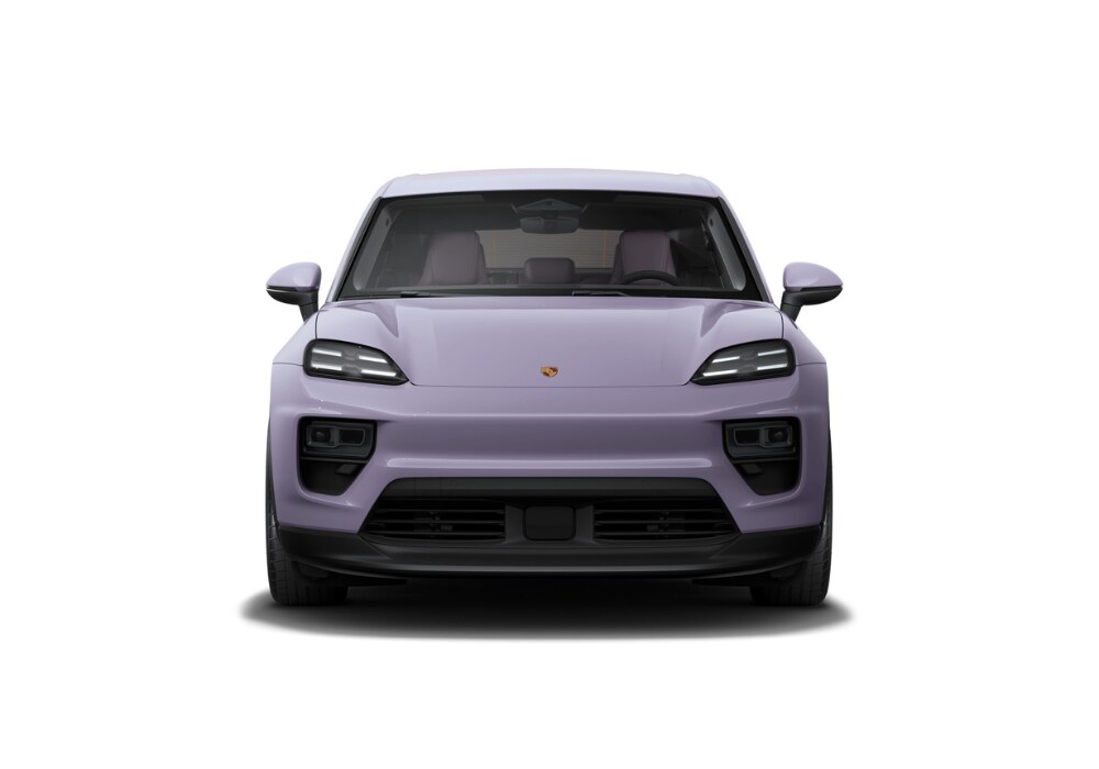 Front view of a purple 2025 Porsche Macan Electric in front a white background