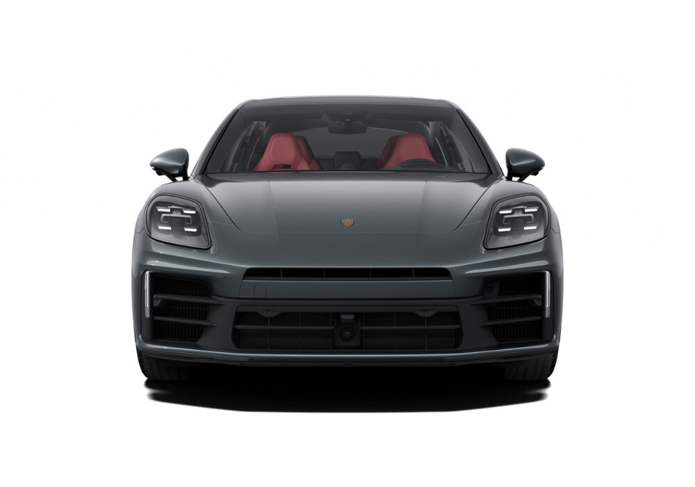 Front view of a 2025 Porsche ICE Panamera. The interior of the car is red and the car is in front of a white background
