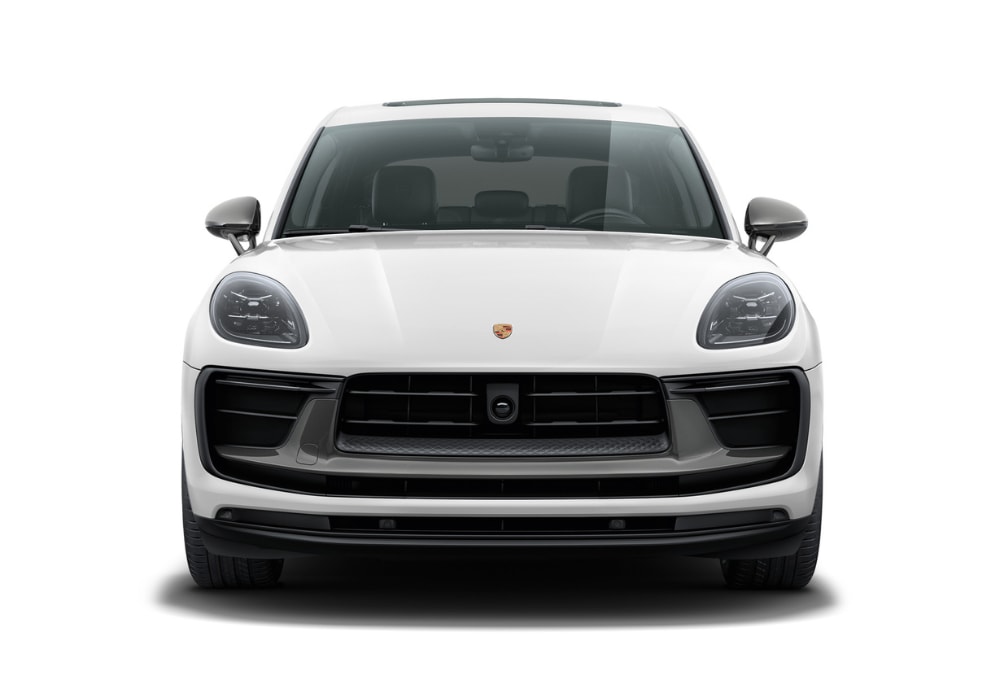 White 2025 Porsche Macan parked in front of a white background