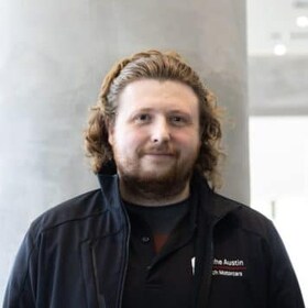 Staff member Aaron Hajke from ID_a64e703bce36