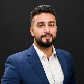 Staff member Niram Maroukel from ID_078e90cd5d29