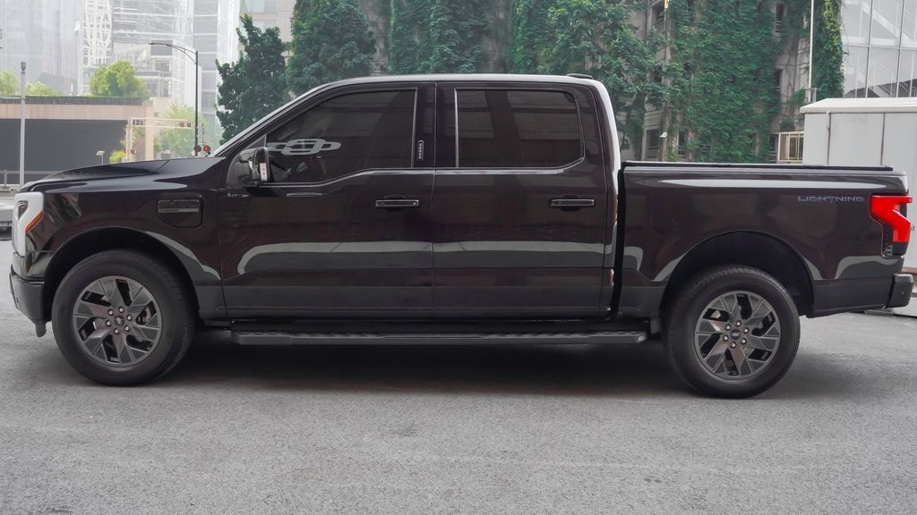 Used 2023 Ford F-150 Lightning Lariat with VIN 1FT6W1EV1PWG03727 for sale in Chicago, IL