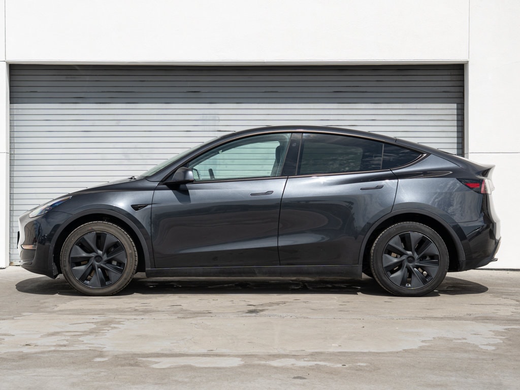 Used 2025 Tesla Model Y Long Range with VIN 7SAYGDEE5SF281164 for sale in Fresno, CA