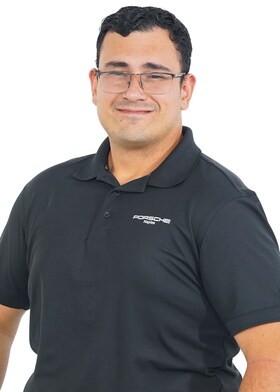 Staff member Carlos Justiniano from ID_da82e839e040