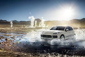 Porsche Oil Change Porsche Cayenne fording a small stream